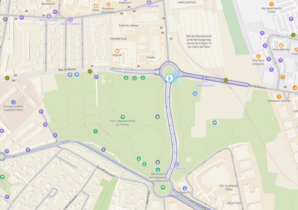 Une vue cartographique des alentours du rond-point Linda de Suza, avec les pistes cyclables qui sont très visibles surlignées de bleu. Elle sont discontinues.